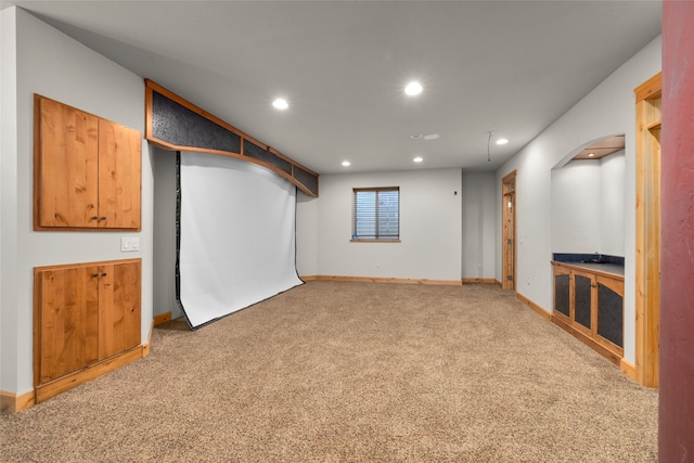 basement featuring carpet flooring