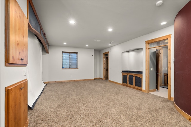 interior space with light colored carpet