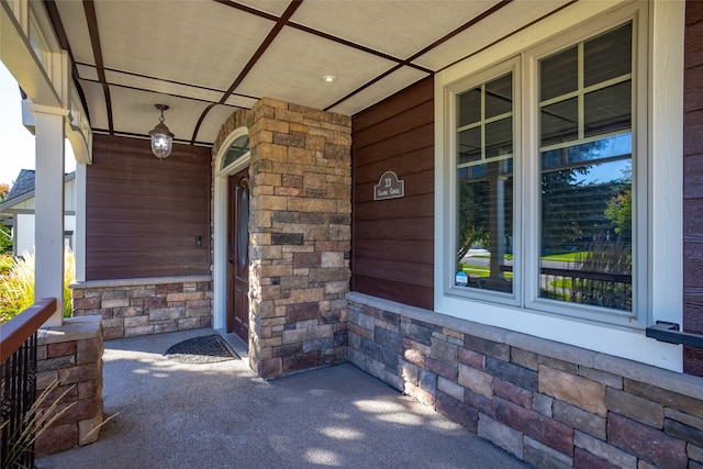 entrance to property with covered porch