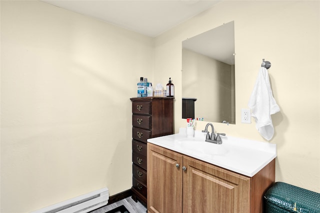 bathroom featuring vanity and a baseboard heating unit