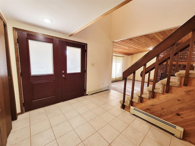 tiled foyer featuring french doors, baseboard heating, lofted ceiling, and wood ceiling