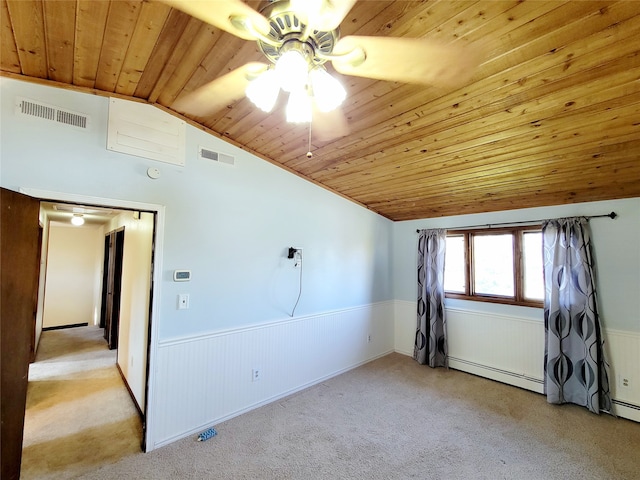 unfurnished room featuring baseboard heating, light colored carpet, wood ceiling, and vaulted ceiling