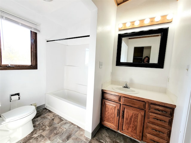 full bathroom with vanity, tub / shower combination, and toilet