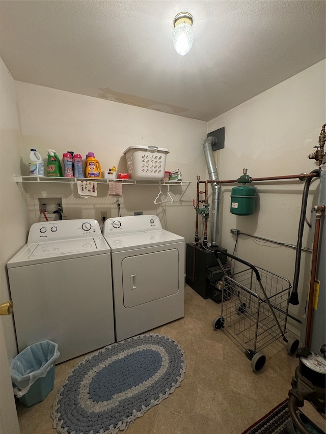 laundry room featuring stacked washer and clothes dryer