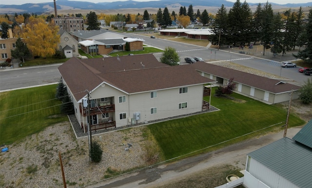 birds eye view of property featuring a mountain view