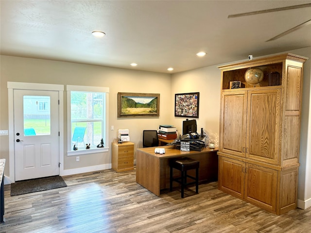 office with hardwood / wood-style floors