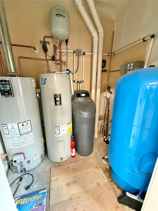 utility room with gas water heater and water heater