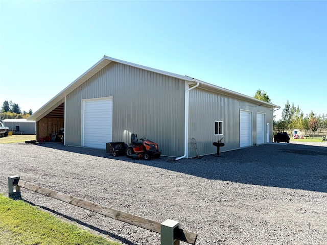 view of outdoor structure featuring a garage