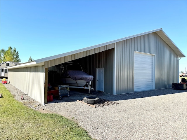 view of outbuilding featuring a garage