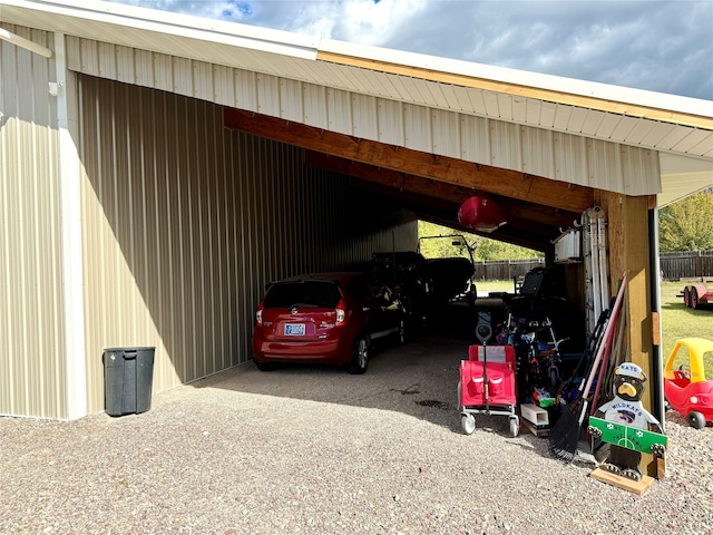 view of parking / parking lot featuring a carport