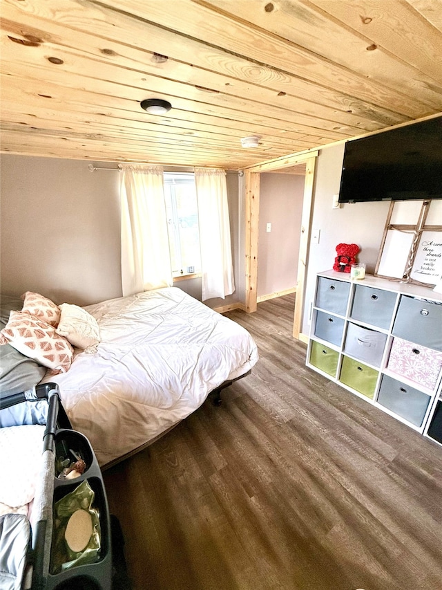 bedroom featuring wood ceiling and hardwood / wood-style floors