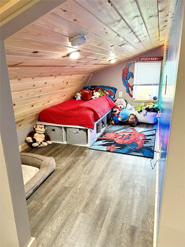 bedroom with lofted ceiling, hardwood / wood-style floors, and wood ceiling