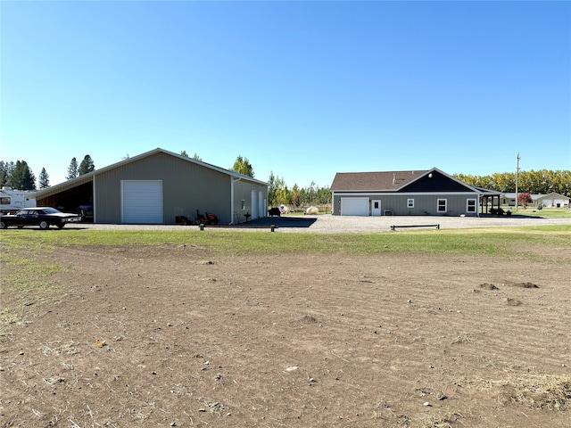 view of yard with a garage