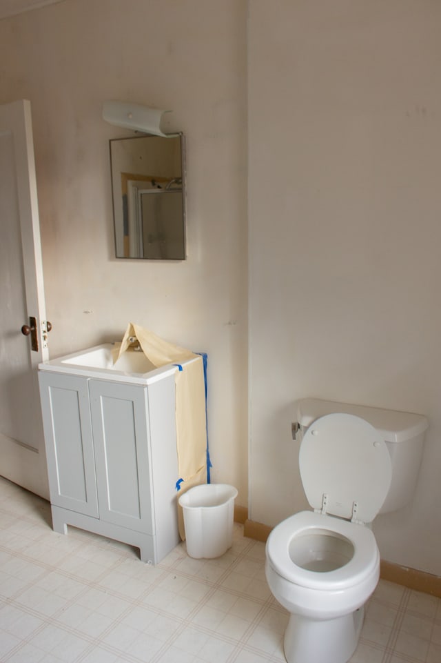 bathroom with vanity and toilet