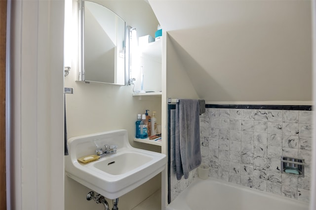 bathroom featuring a tub to relax in