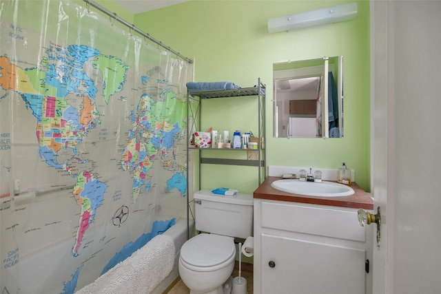 bathroom with a wall mounted AC, vanity, and toilet