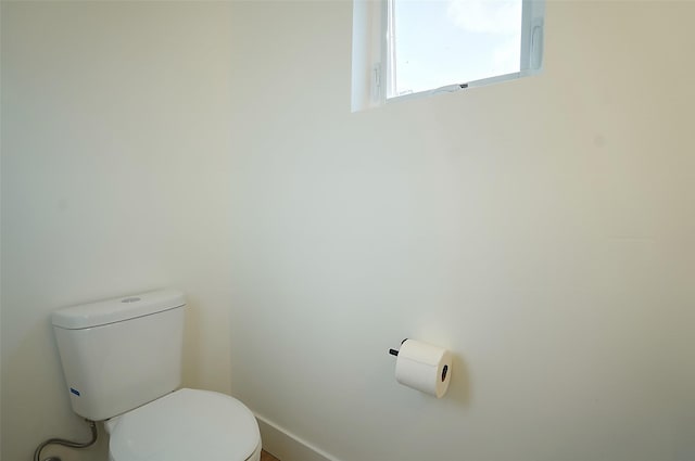 bathroom featuring toilet