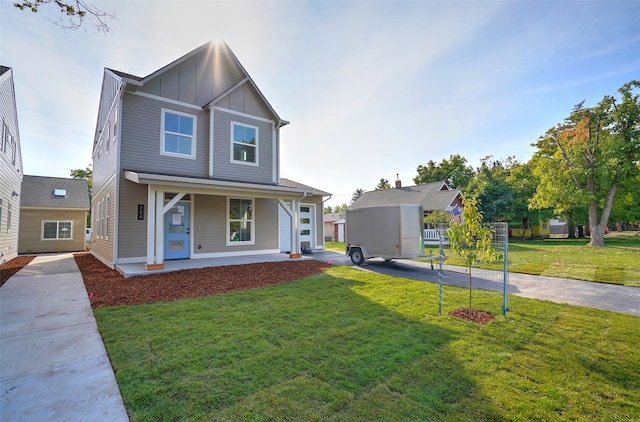 view of front of home featuring a porch and a front yard