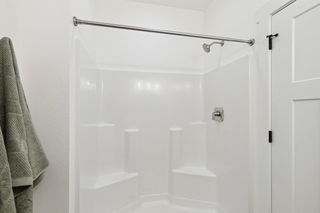 bathroom featuring walk in shower