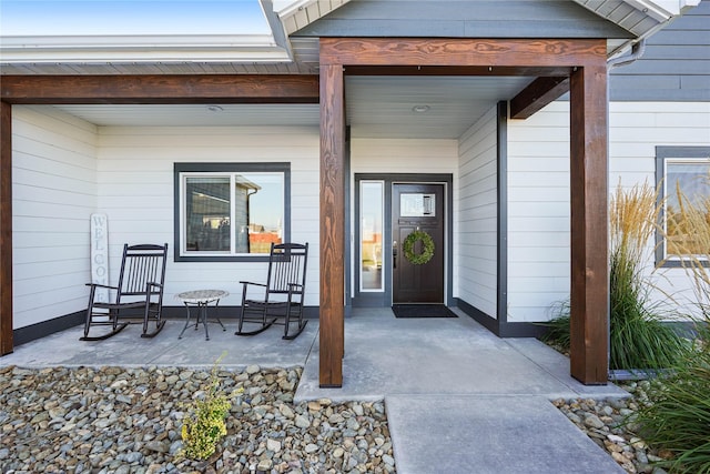 entrance to property with covered porch