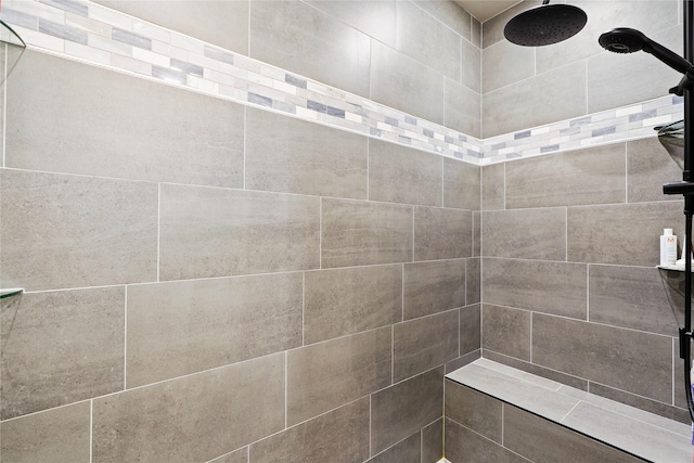 bathroom featuring tiled shower