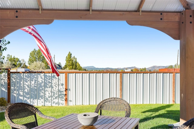 view of patio / terrace with a mountain view