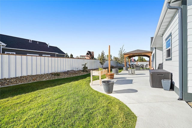 view of yard with a gazebo and a patio