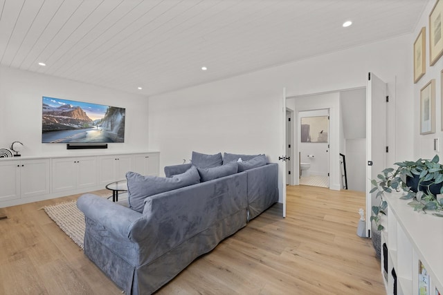 living area with light wood-type flooring, wooden ceiling, and recessed lighting