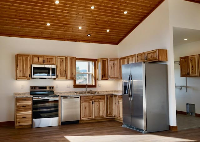 72 River Ct N, Eureka, MT 59917 - kitchen with a sink, appliances with stainless steel finishes, wooden ceiling, and dark wood-style floors