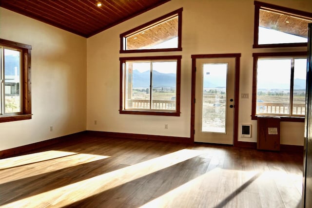 72 River Ct N, Eureka, MT 59917 - empty room with wood ceiling, baseboards, wood finished floors, and lofted ceiling