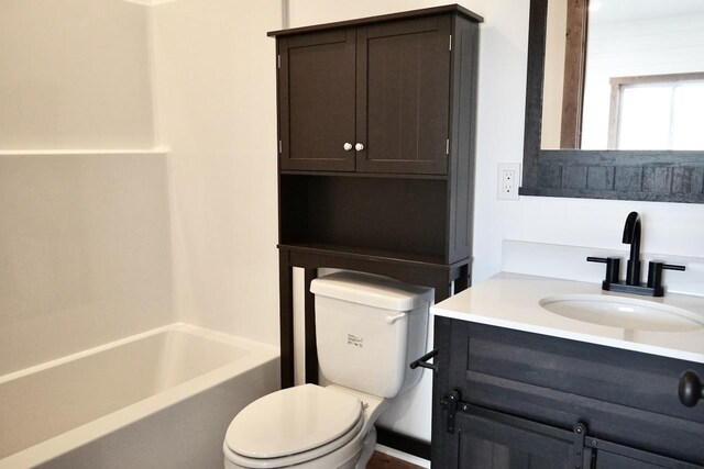 72 River Ct N, Eureka, MT 59917 - full bath featuring toilet, vanity, and  shower combination