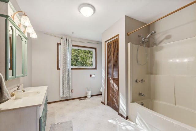 1627 Foothill Rd, Kalispell, MT 59901 - bathroom with vanity, tile patterned floors, bathtub / shower combination, toilet, and baseboards