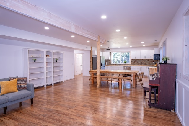 dining room with hardwood / wood-style floors