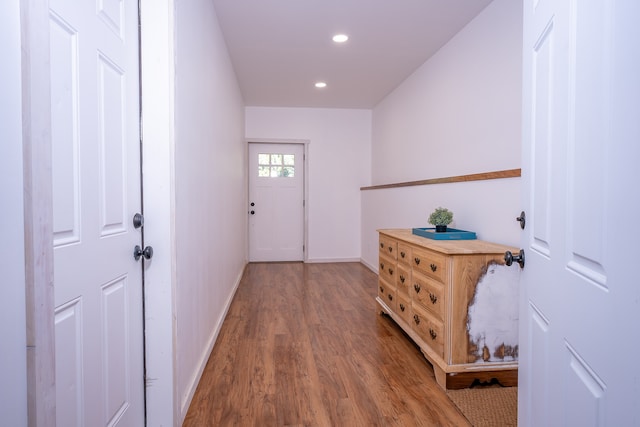 doorway with hardwood / wood-style floors