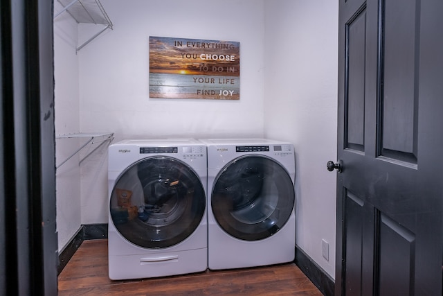 washroom featuring independent washer and dryer and dark hardwood / wood-style flooring