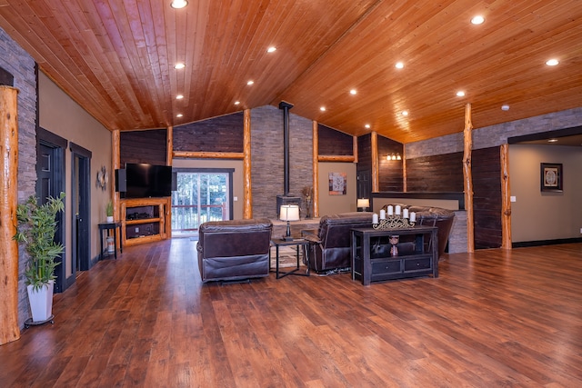 living room featuring a wood stove, high vaulted ceiling, dark wood-type flooring, and wood ceiling