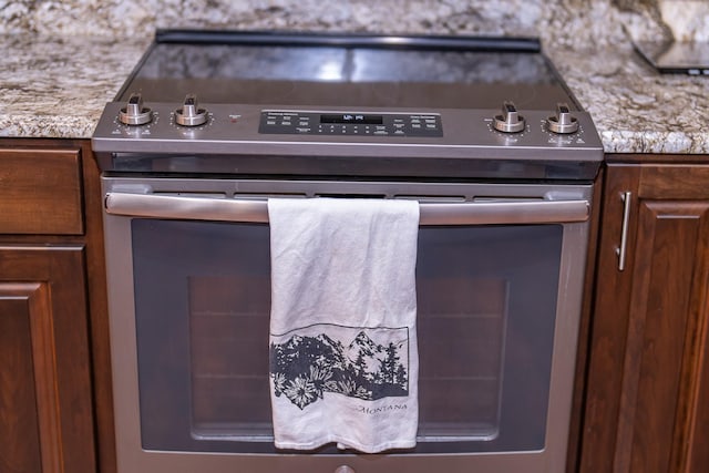 44 Copper Ridge Rd, Trout Creek, MT 59874 - details with light countertops and stainless steel range with electric cooktop