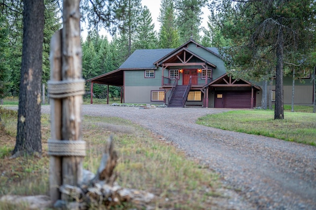 44 Copper Ridge Rd, Trout Creek, MT 59874 - rustic home featuring covered porch, driveway, and stairway