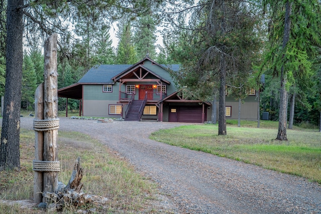 view of front of home featuring a garage and covered porch