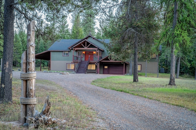 44 Copper Ridge Rd, Trout Creek, MT 59874 - chalet / cabin featuring a porch, stairs, and dirt driveway