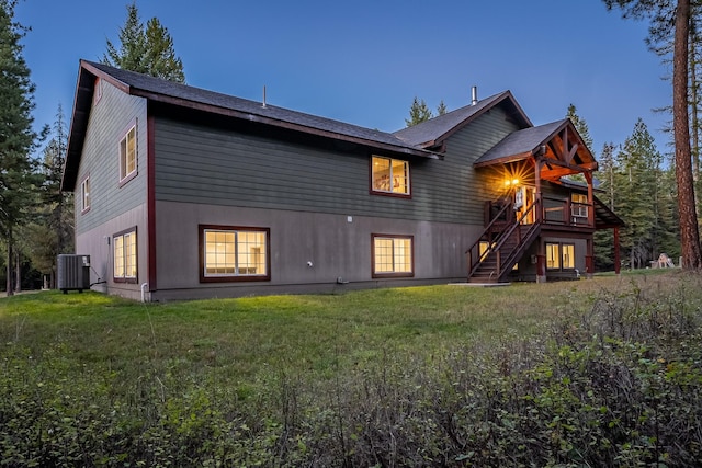 44 Copper Ridge Rd, Trout Creek, MT 59874 - rear view of property featuring central AC unit, a yard, stairs, and french doors