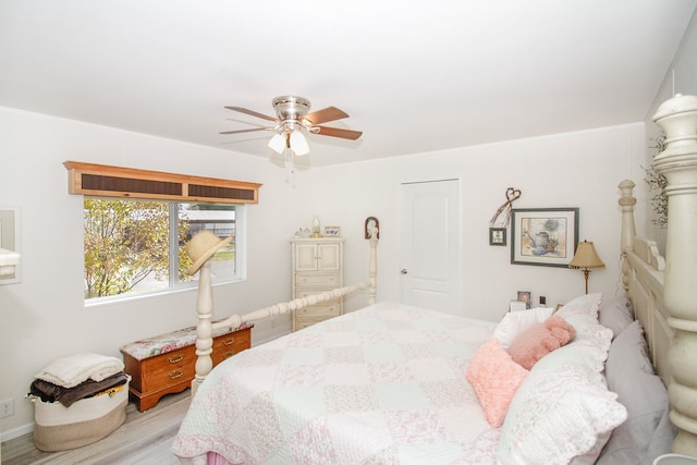 bedroom featuring ceiling fan and light wood-type flooring