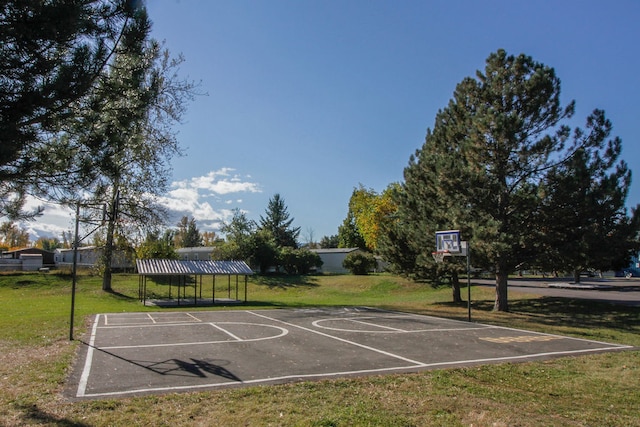 view of basketball court with a gazebo and a lawn