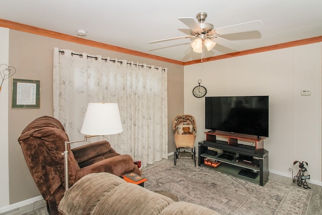 living room featuring wood-type flooring, ceiling fan, and ornamental molding