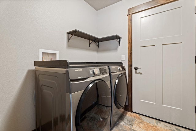 laundry area featuring independent washer and dryer