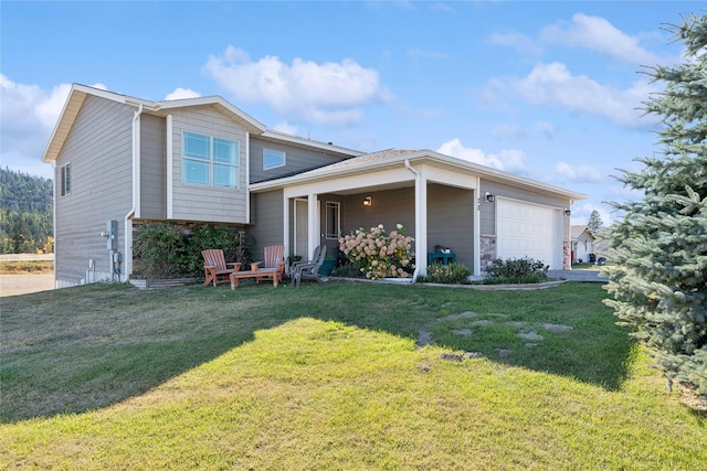 28 W Ashley Hills Dr, Kalispell, MT 59901 - tri-level home featuring a garage and a front yard