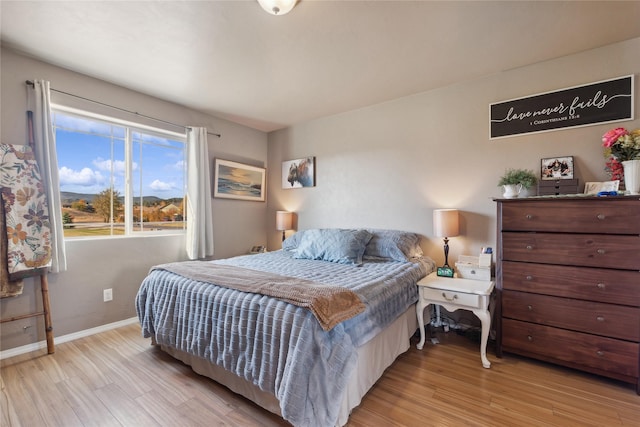 28 W Ashley Hills Dr, Kalispell, MT 59901 - bedroom with wood finished floors and baseboards
