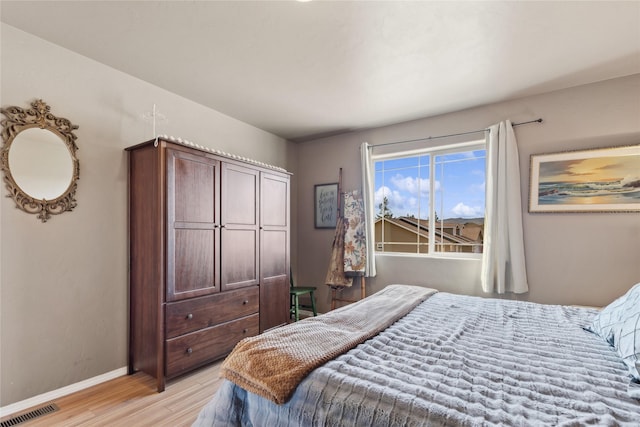 28 W Ashley Hills Dr, Kalispell, MT 59901 - bedroom featuring light wood-style flooring and baseboards