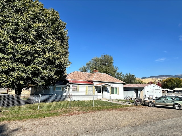 view of front of property with a mountain view