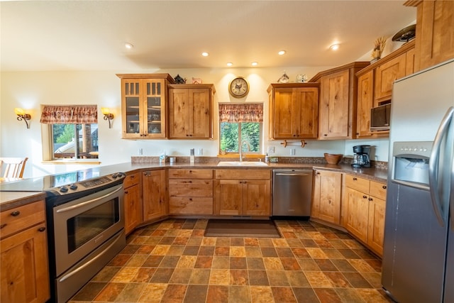 kitchen featuring stainless steel appliances and sink